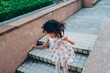 © Pansfun Images/Stocksy - asian little girl jumping