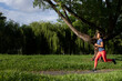 © Felix Hug/Stocksy - asian woman running in the park