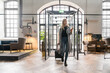 © Hernandez & Sorokina/Stocksy - Woman Entering In The Hotel