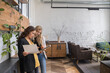 © Hernandez & Sorokina/Stocksy - Two Colleagues Working Together Indoors