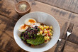 © Jarusha Brown Photography/Stocksy - Mexican style healthy breakfast on wooden table.