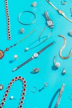 Jewellery,Diamonds, Ruby, Gold, Silver Etc/ On Turquoise Background