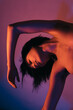 © Lucas Ottone/Stocksy - Naked woman in colorful lights