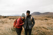 © Kristen Curette Photography LLC/Stocksy - Young couple hiking.
