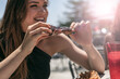 © Sean Locke Photography/Stocksy - BBQ: Cute Woman Eating Smoked Baby Back Ribs