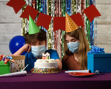 Children Wearing Face Masks Celebrating Birthday