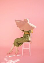 Fashion Portrait Of Woman In Pink Hat