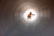 © Hugh Sitton/Stocksy - Construction worker inspecting water pipeline. India.