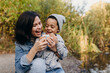 © Stereo Shot/Stocksy - multiracial family in the park