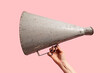 © Natalie JEFFCOTT/Stocksy - Megaphone in hand