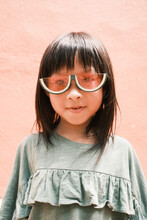 Portrait Of Cute Little Girl With Fashion Sunglass
