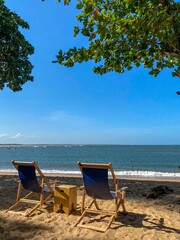 two chairs on a beach