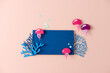 © Maki Company Limited/Stocksy - Coral reef copy space frame template with colorful papercut jellyfish on pink background.