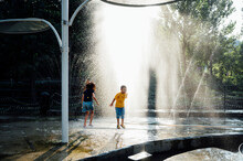 Children Playing With Water