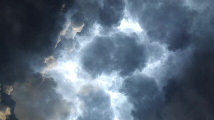 Wall Mural - dark cumulonimbus clouds with lightning bolting, point of view.