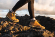 © Kike Arnaiz/Stocksy - Closeup on mountain shoes