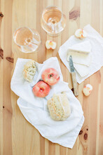 Rose Wine With Fresh French Bread, Cheese And Peaches