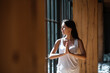 © Milles Studio/Stocksy - Young woman meditating in sunlight