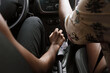 © Jimena Roquero/Stocksy - Woman's hand on gear stick in a car