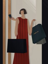 Woman With Purchases Holds A Credit Card In Her Hand