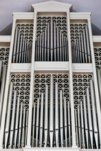 Ornate Organ Pipes In Church