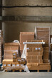 © Jelena Jojic Tomic/Stocksy - A small warehouse packed with a carload ready for distribution
