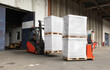 © Jelena Jojic Tomic/Stocksy - The worker transports freight using a forklift