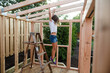 © Maria Manco/Stocksy - kids building a club house