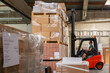 © Jelena Jojic Tomic/Stocksy - The worker transports freight using a forklift