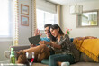 © Jayme Burrows Photography/Stocksy - Couple Doing Video Chat on a Tablet