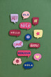 © Maki Company Limited/Stocksy - Colorful stickers with emotional phrases.