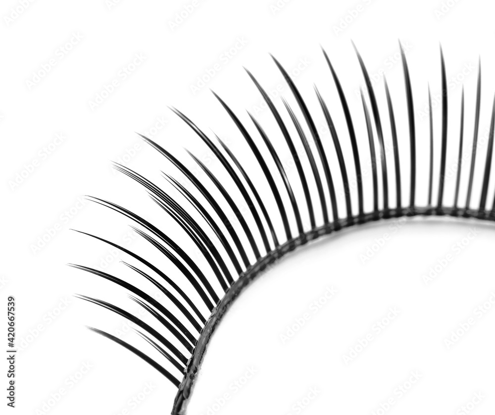 False eyelashes on white background, closeup