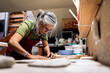 © Nunez Image/Stocksy - Woman Working in Pottery Workshop
