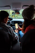 © Bisual Studio/Stocksy - Couple Choosing Route For Road Trip
