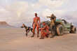 © Don Smith/Stocksy - Futuristic soldiers with robot dog cyborg and jeep in desert pointing