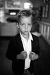 © Jakob Lagerstedt/Stocksy - Handsome young boy wearing a blazer