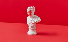 Gypsum Goddess Statue With Red Paint On The Face.