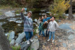 © Bisual Studio/Stocksy - Group of friends taking a selfie photo in autumnal day