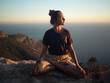 © ZHPH Production by Artem Zhushman/Stocksy - Young woman meditate on the rock