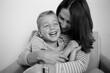 © Jakob Lagerstedt/Stocksy - Mother and son laughing together