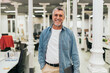 © Nunez Image/Stocksy - Middle age man in Office Portrait