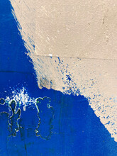 Close Up Paint Covering Graffiti Markings On Urban Wall