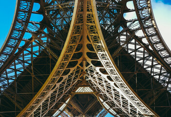 inside the eiffel tower in paris, france. view to the inside of eiffel tower. big symetrical buildin