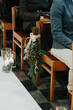 © Melissa Milis Photography/Stocksy - winter floral decoration in church