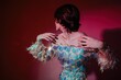 © Liliya Rodnikova/Stocksy - Anonymous androgynous model in shimmering dress