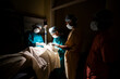 © Apratim Saha/Stocksy - Medical Practitioners Making Surgery On Patient