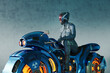 © Don Smith/Stocksy - Futuristic motorcycle with policewoman rider