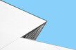 © Vaidas Bucys/Stocksy - Dynamic modern architecture against blue sky