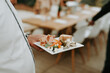 © Melissa Milis Photography/Stocksy - man with a plate full of food