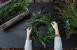 © Melanie DeFazio Photography/Stocksy - Making Wreaths